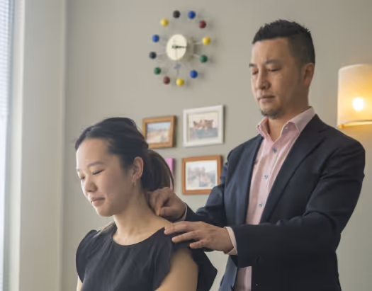 Dr Scott Ling treating patients at Sustain Health